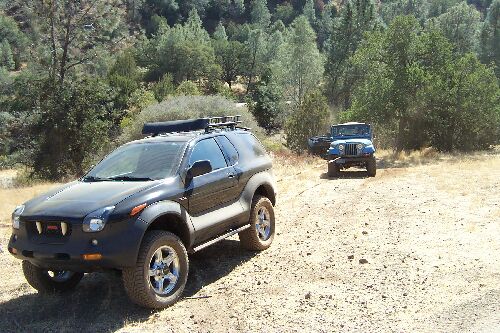 VX towing a Jeep