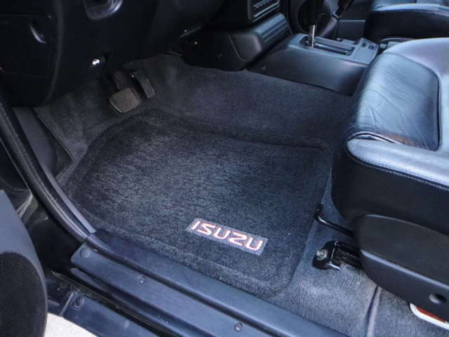 Carpet mat in front of driver seat