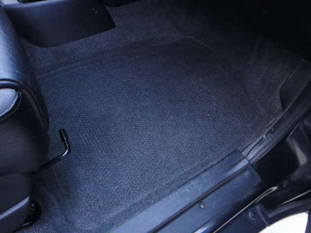 carpet under floor mat on passenger side