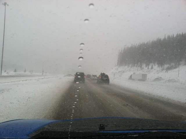 Snow on pass heading out to Moab