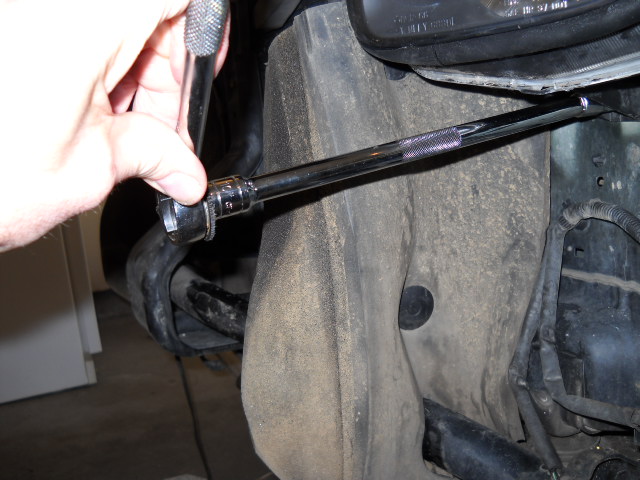 Extension to remove headlamp lower bolts