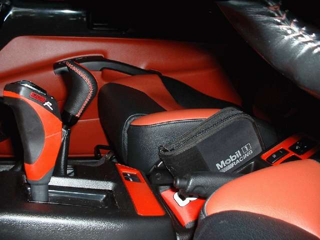 OBX Tomcat A/T Shifter; MOMO (low range) Shifter; console with red accents