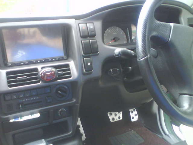 buttons mounted by steering wheel