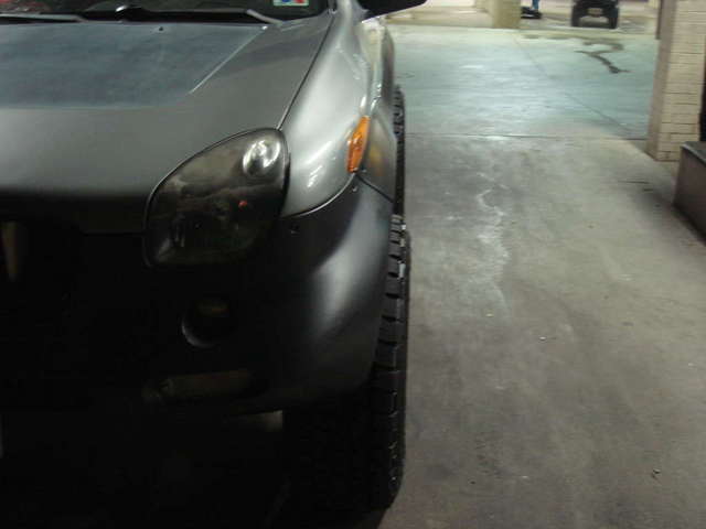 how much new tires and rims stick out front