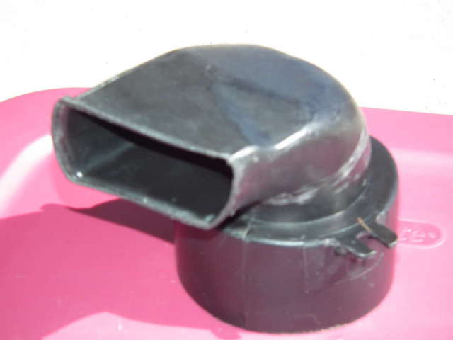 Black plastic elbow shaped piece (??)