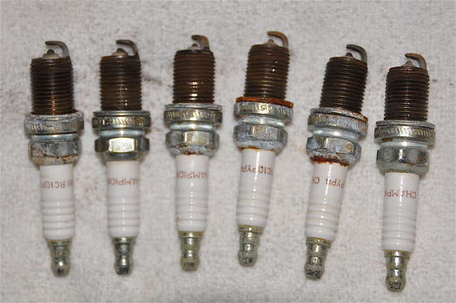 Old Champion spark plugs removed. UGH!  Replaced with NGK platinums