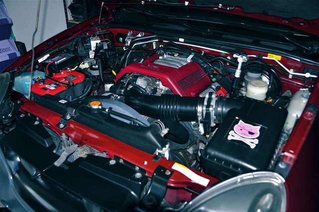 Engine bay, custom painted engine cover