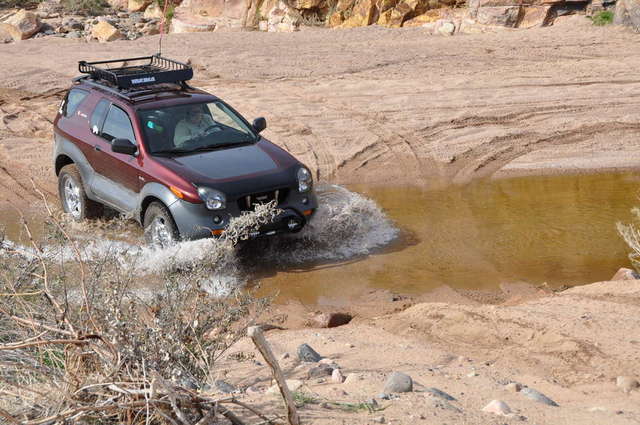 Kat crossing the New River on Table Mesa Rd trail