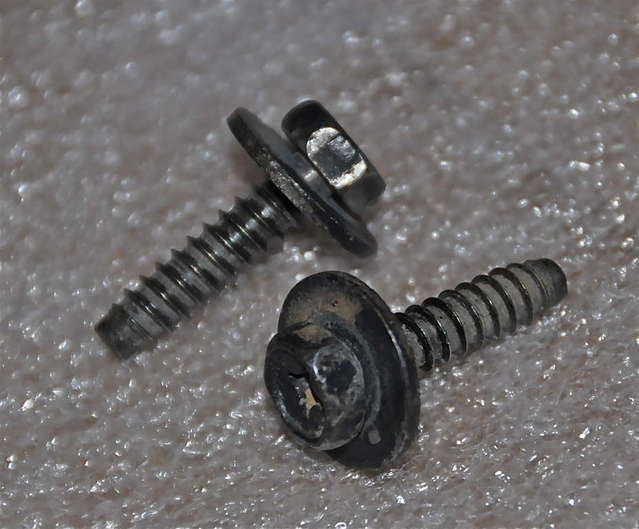 Flange bolts from wheel wells