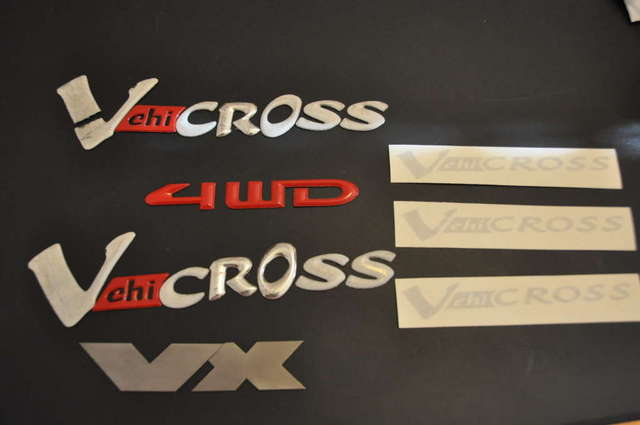 Used badges &amp; vinyl decals
