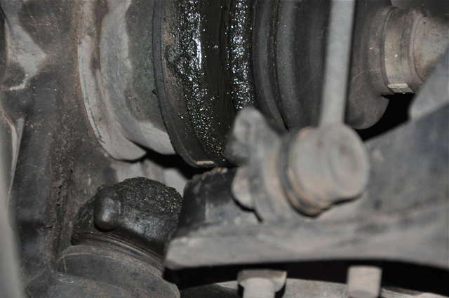 Torn CV boot- pass side