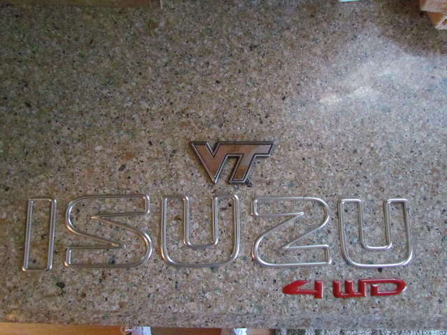 Rear door badges