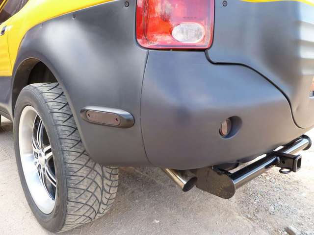 repaired rear bumper/smoked out signal lamp