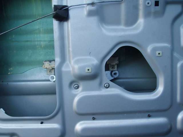 window unbolted from arm and pushed into rear guide
