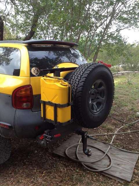 Swing tire carrier