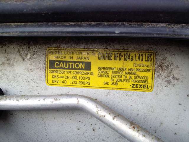 Zexel A/C Sticker on the firewall