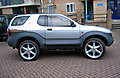 Side_view_as_it_came_Antera_22inch_Wheels.JPG