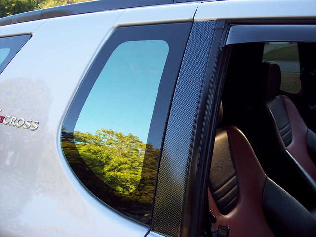 Carbon covered door pillar