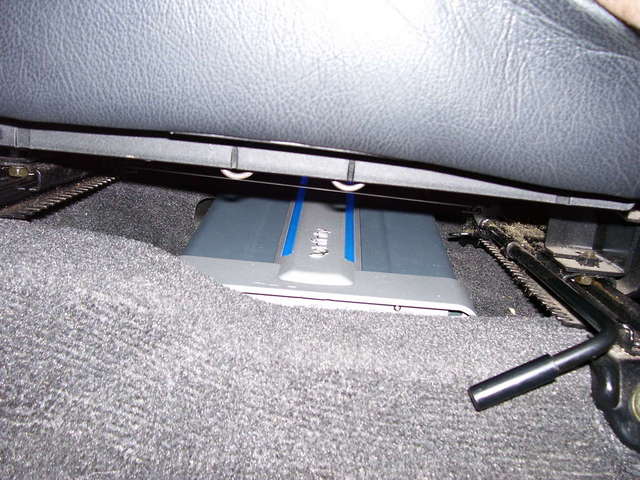 Amp under driver's seat.