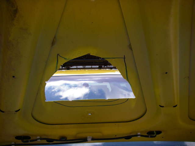 hole in hood for scoop